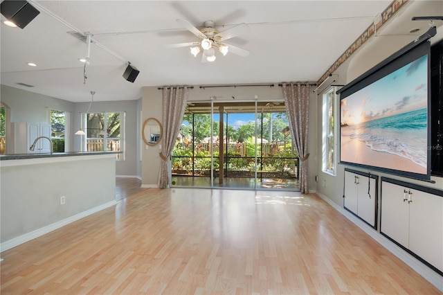 2794 Cullens Ct, Ocoee, FL 34761 - unfurnished room featuring plenty of natural light, light wood finished floors, ceiling fan, and recessed lighting