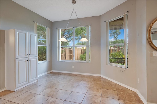 2794 Cullens Ct, Ocoee, FL 34761 - unfurnished dining area featuring light tile patterned floors and baseboards