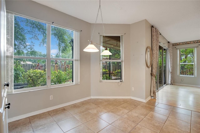 2794 Cullens Ct, Ocoee, FL 34761 - unfurnished dining area with plenty of natural light and light tile patterned flooring