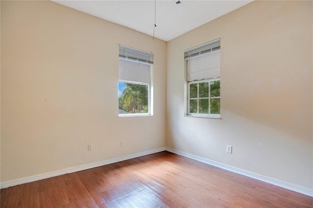 2794 Cullens Ct, Ocoee, FL 34761 - empty room with wood finished floors and baseboards