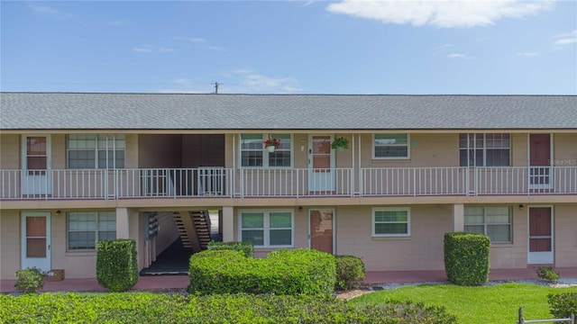 1100 E Caroline St Unit 204, Tavares, FL 32778 - view of building exterior with stairs