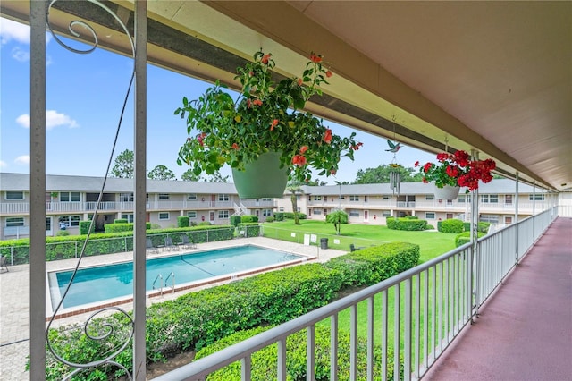 1100 E Caroline St Unit 204, Tavares, FL 32778 - community pool with a residential view and a lawn