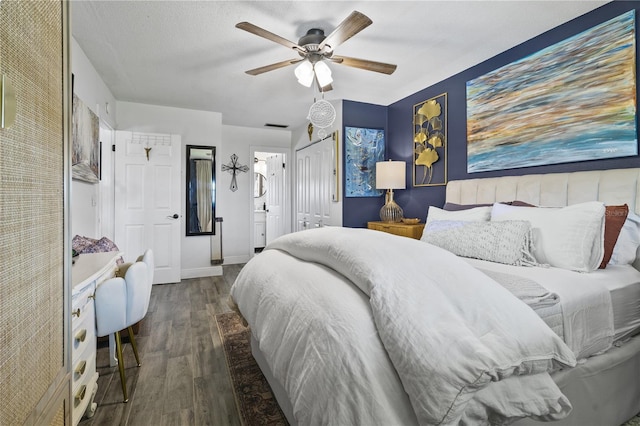 1100 E Caroline St Unit 204, Tavares, FL 32778 - bedroom featuring wood finished floors, a ceiling fan, ensuite bath, and a closet