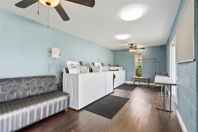 1100 E Caroline St Unit 204, Tavares, FL 32778 - shared laundry room featuring a ceiling fan, dark wood finished floors, and washer and dryer