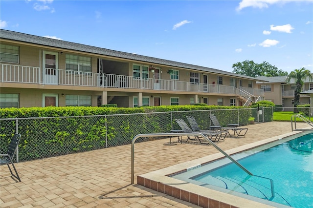 1100 E Caroline St Unit 204, Tavares, FL 32778 - community pool featuring a patio area