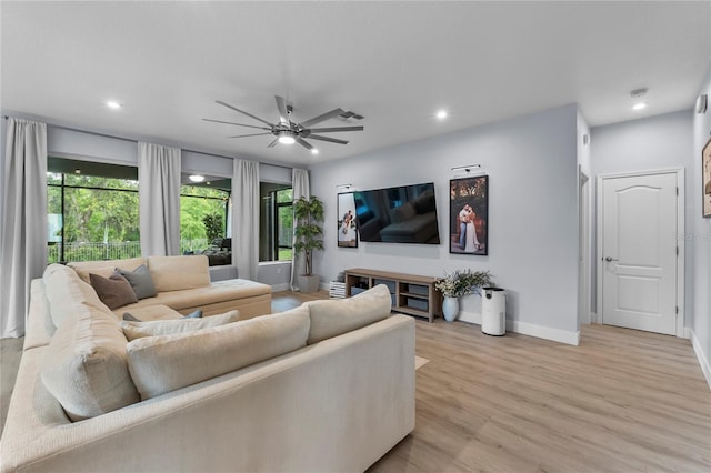 17676 Passionflower Cir, Clermont, FL 34714 - living area featuring plenty of natural light, light wood finished floors, recessed lighting, and ceiling fan