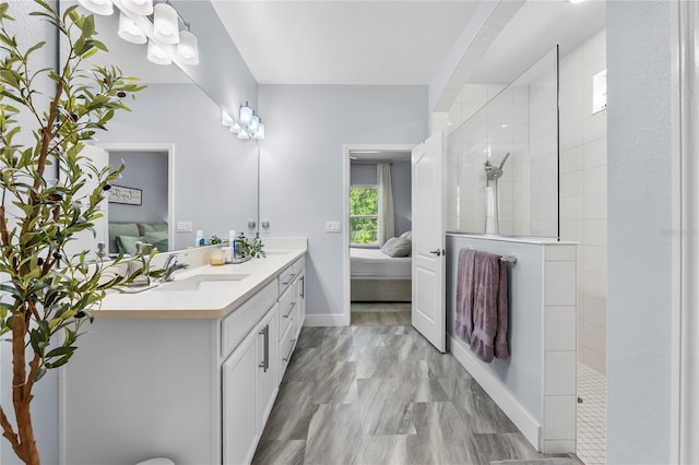 17676 Passionflower Cir, Clermont, FL 34714 - ensuite bathroom with double vanity and a walk in shower