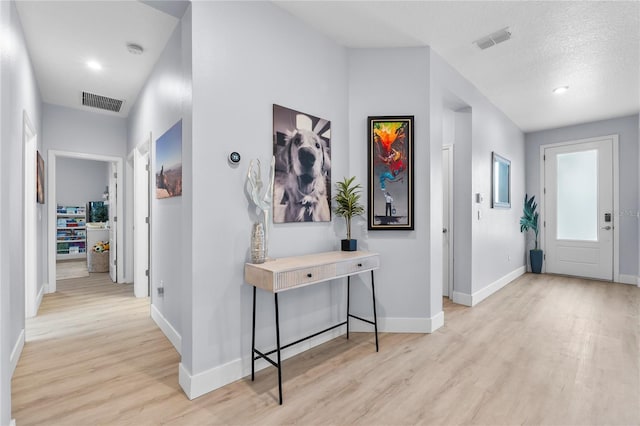 17676 Passionflower Cir, Clermont, FL 34714 - foyer featuring light wood-style flooring and recessed lighting