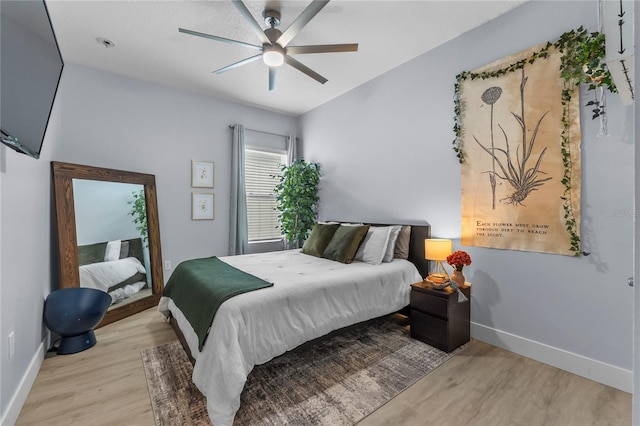 17676 Passionflower Cir, Clermont, FL 34714 - bedroom featuring wood finished floors and ceiling fan