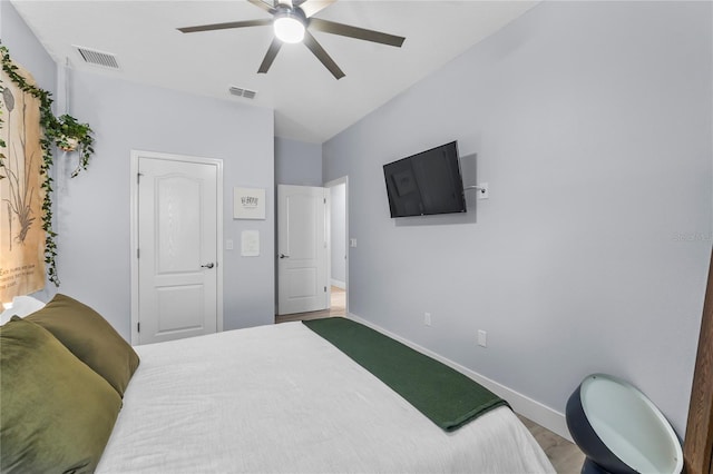 17676 Passionflower Cir, Clermont, FL 34714 - bedroom featuring baseboards and ceiling fan