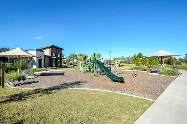 17676 Passionflower Cir, Clermont, FL 34714 - community play area featuring a lawn