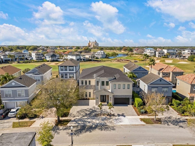 1526 Euston Dr, Reunion, FL 34747 - aerial view of residential area featuring a golf course and a nearby body of water