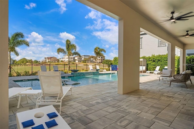 1526 Euston Dr, Reunion, FL 34747 - view of swimming pool featuring a ceiling fan and a patio area