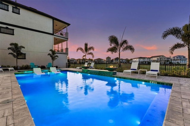 1526 Euston Dr, Reunion, FL 34747 - view of pool at dusk