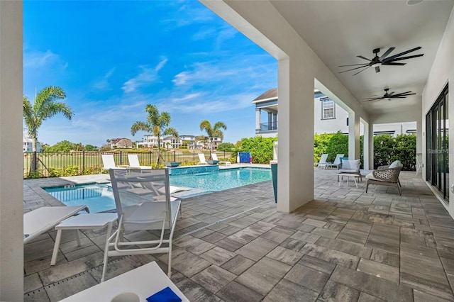 1526 Euston Dr, Reunion, FL 34747 - view of swimming pool featuring ceiling fan and a patio area