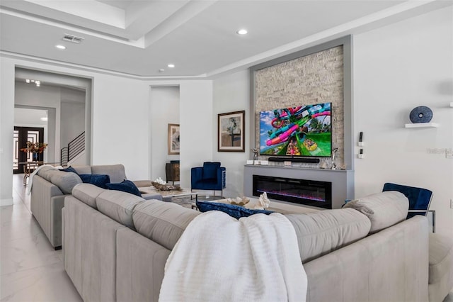 1526 Euston Dr, Reunion, FL 34747 - living area featuring recessed lighting, light marble finish floors, and a glass covered fireplace