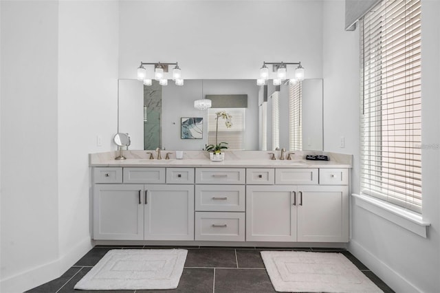 1526 Euston Dr, Reunion, FL 34747 - bathroom with double vanity, plenty of natural light, a shower, and tile patterned flooring