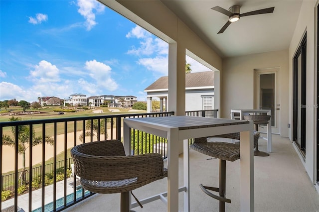 1526 Euston Dr, Reunion, FL 34747 - balcony with ceiling fan and a residential view