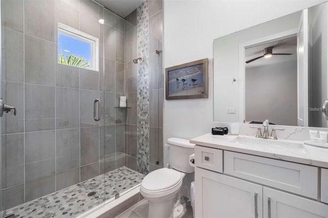 1526 Euston Dr, Reunion, FL 34747 - full bathroom featuring vanity, a stall shower, and ceiling fan
