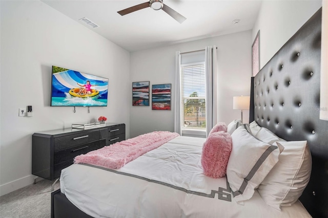 1526 Euston Dr, Reunion, FL 34747 - bedroom featuring light carpet and ceiling fan