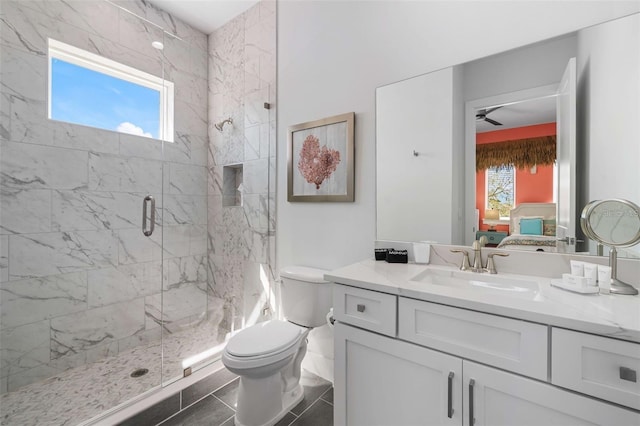 1526 Euston Dr, Reunion, FL 34747 - ensuite bathroom with a marble finish shower, vanity, and a ceiling fan