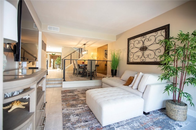 4203 Fairway Run, Tampa, FL 33618 - living area with a chandelier and light tile patterned floors