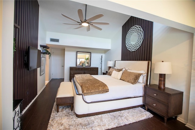 4203 Fairway Run, Tampa, FL 33618 - bedroom featuring wood finished floors, vaulted ceiling, and a ceiling fan
