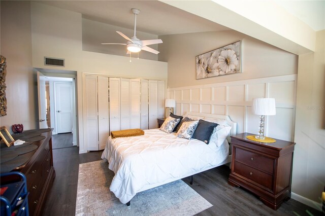 4203 Fairway Run, Tampa, FL 33618 - bedroom featuring dark wood-style floors, a closet, high vaulted ceiling, and ceiling fan