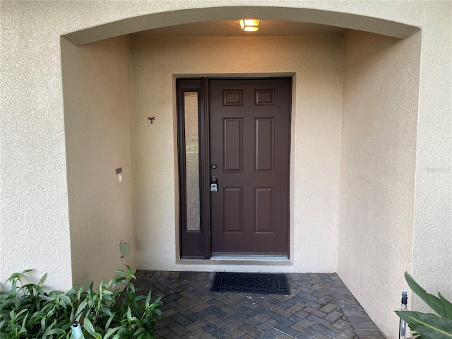 1227 Juniper Hammock St, Winter Garden, FL 34787 - property entrance with stucco siding
