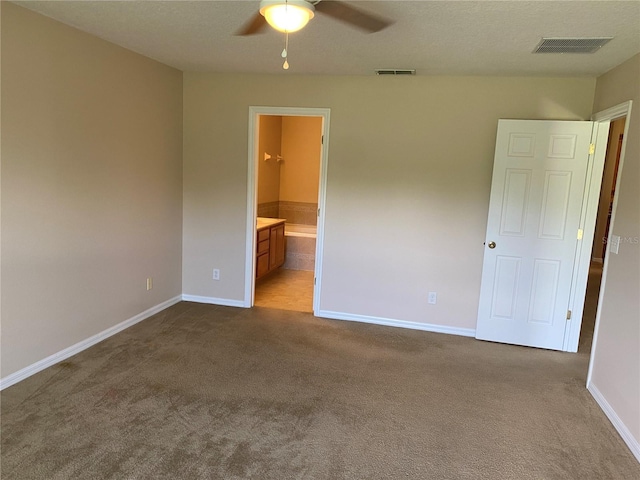 1227 Juniper Hammock St, Winter Garden, FL 34787 - unfurnished bedroom featuring carpet flooring, ensuite bath, and ceiling fan