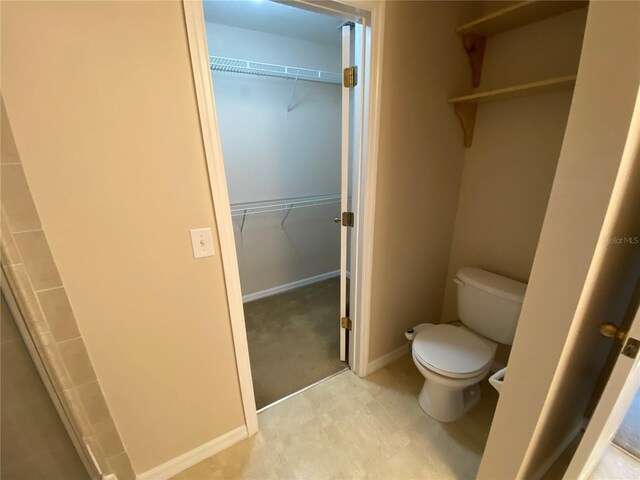 1227 Juniper Hammock St, Winter Garden, FL 34787 - bathroom featuring toilet and a spacious closet
