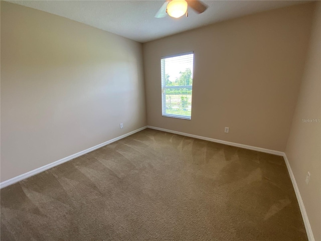 1227 Juniper Hammock St, Winter Garden, FL 34787 - carpeted empty room with baseboards and a ceiling fan