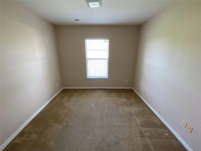 1227 Juniper Hammock St, Winter Garden, FL 34787 - spare room featuring carpet and baseboards