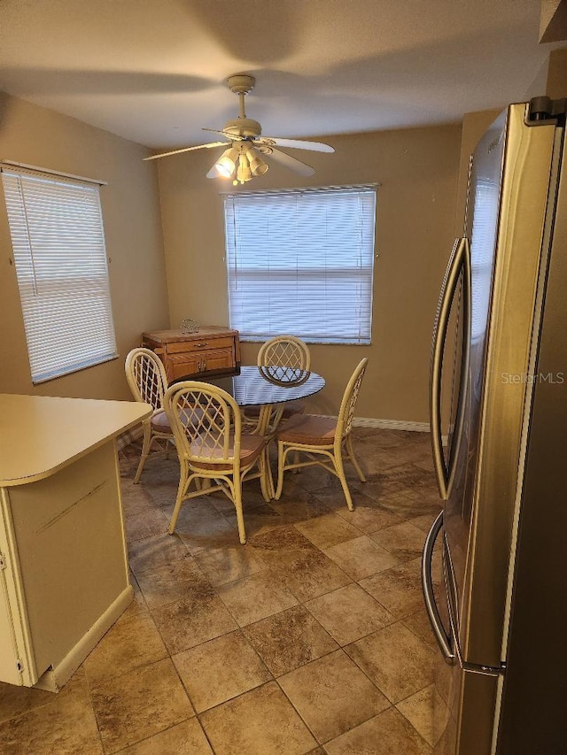 1626 Willow Run, Sebring, FL 33872 - dining room with healthy amount of natural light, a ceiling fan, and light stone finish floors