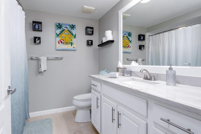 12204 Wild Iris Way Unit 108, Orlando, FL 32837 - full bathroom with vanity, tile patterned flooring, and a textured ceiling