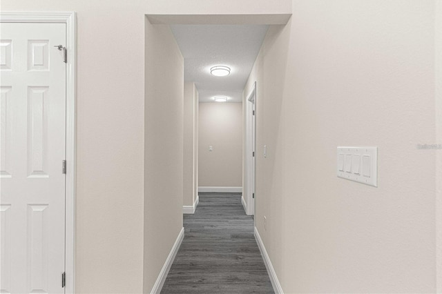 12756 SW 80th St, Dunnellon, FL 34432 - hall with baseboards and dark wood-style floors
