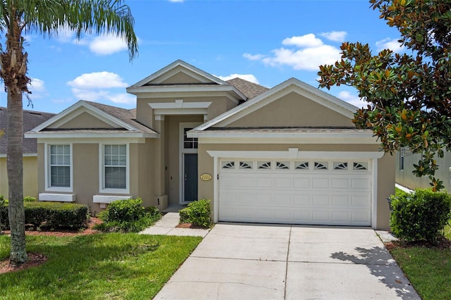 2222 Wyndham Palms Way, Kissimmee, FL 34747 - single story home featuring stucco siding, concrete driveway, an attached garage, and a shingled roof