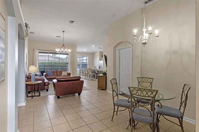 2222 Wyndham Palms Way, Kissimmee, FL 34747 - dining space featuring a chandelier and light tile patterned floors
