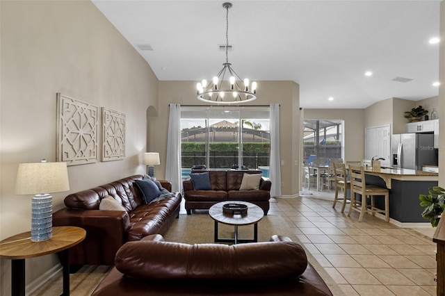 2222 Wyndham Palms Way, Kissimmee, FL 34747 - living area with a chandelier, light tile patterned floors, recessed lighting, and arched walkways