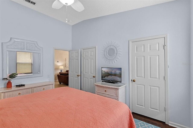 2222 Wyndham Palms Way, Kissimmee, FL 34747 - bedroom featuring dark wood-style flooring, high vaulted ceiling, and ceiling fan