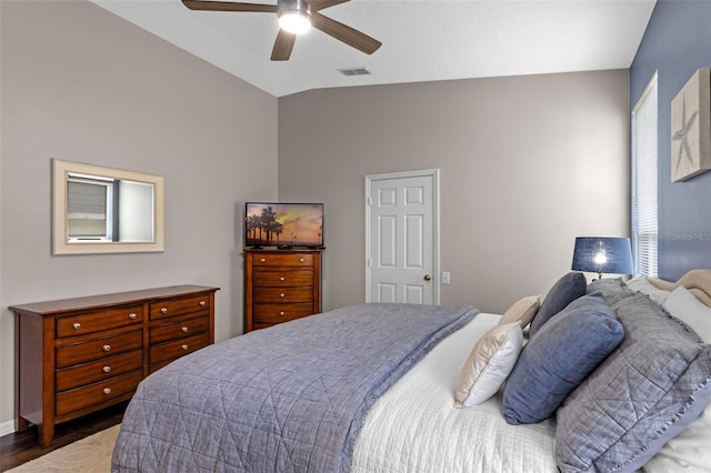 2222 Wyndham Palms Way, Kissimmee, FL 34747 - bedroom featuring vaulted ceiling, ceiling fan, and wood finished floors
