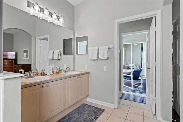 2222 Wyndham Palms Way, Kissimmee, FL 34747 - full bathroom featuring tile patterned flooring and double vanity
