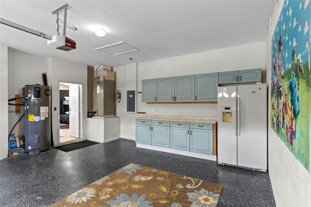 2222 Wyndham Palms Way, Kissimmee, FL 34747 - kitchen featuring white fridge with ice dispenser, water heater, heating unit, electric panel, and a textured ceiling