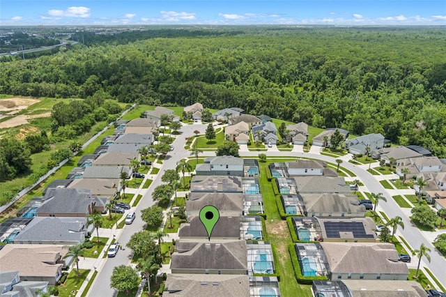 2222 Wyndham Palms Way, Kissimmee, FL 34747 - aerial perspective of suburban area featuring a forest