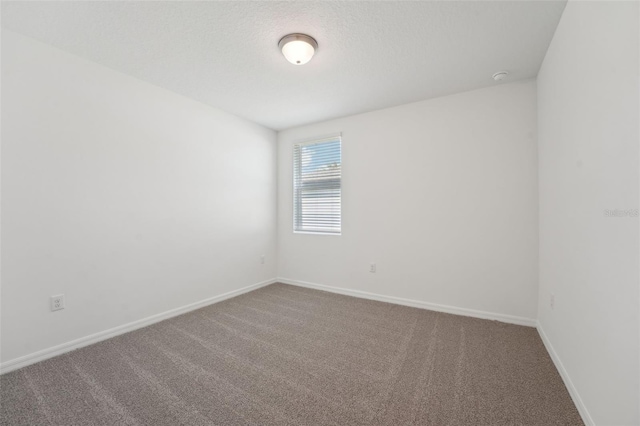 1349 Oak Valley Dr, Auburndale, FL 33823 - empty room with carpet flooring and a smoke detector