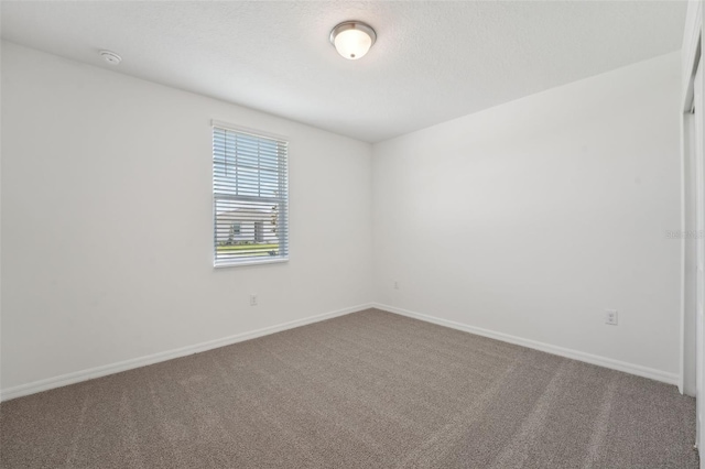 1349 Oak Valley Dr, Auburndale, FL 33823 - unfurnished room featuring carpet floors and a smoke detector