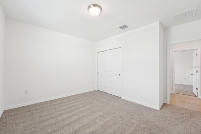 1349 Oak Valley Dr, Auburndale, FL 33823 - unfurnished bedroom with carpet and a closet