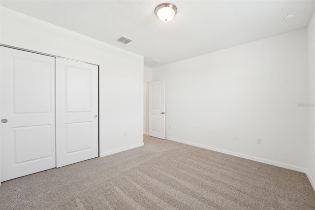 1349 Oak Valley Dr, Auburndale, FL 33823 - unfurnished bedroom with light carpet and a closet