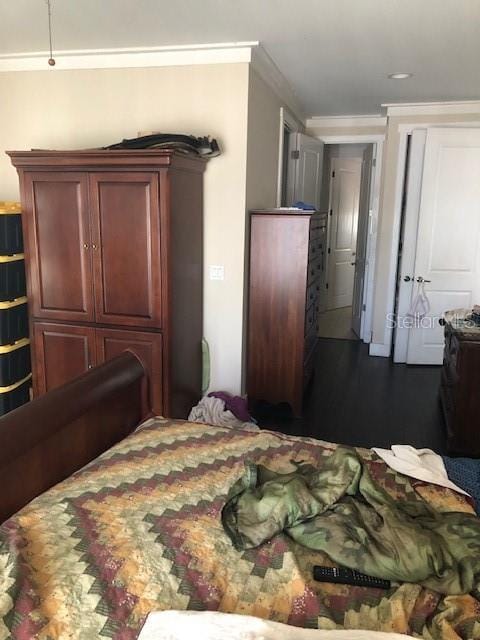 310 W Lake Ave, Auburndale, FL 33823 - bedroom with crown molding and recessed lighting