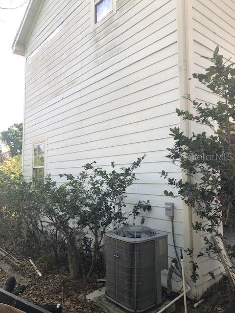 310 W Lake Ave, Auburndale, FL 33823 - exterior view of a central AC unit